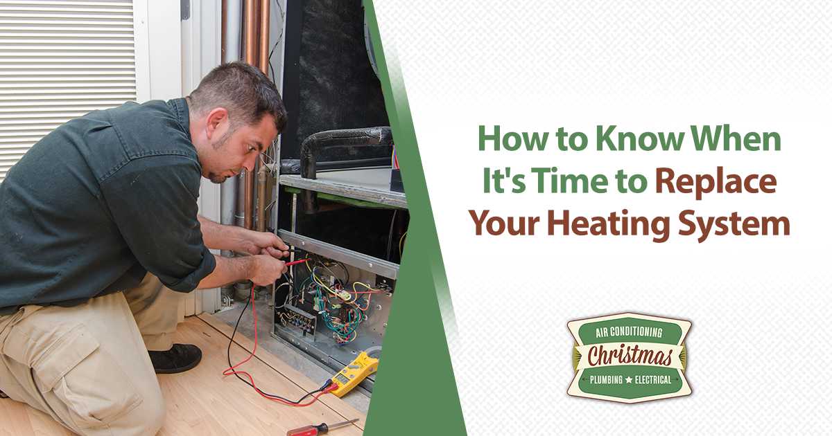 Technician using a multimeter to test heating system components.