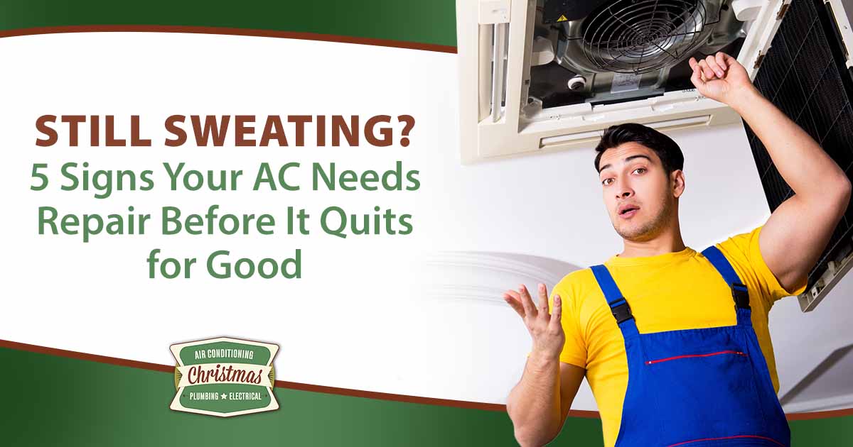 Image of a repairman fixing a ceiling air conditioning unit, featuring Christmas Air Conditioning and Plumbing and highlighting key signs your AC needs repair before it stops working completely.