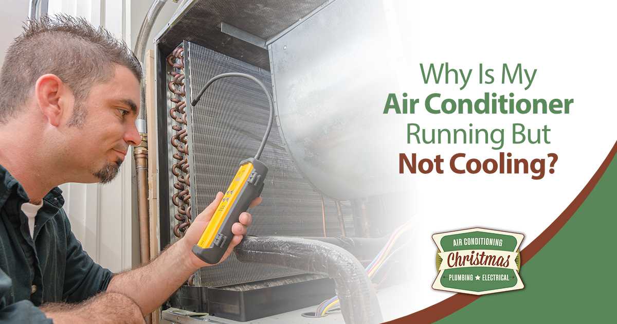 Technician inspecting AC coils with a handheld diagnostic tool.