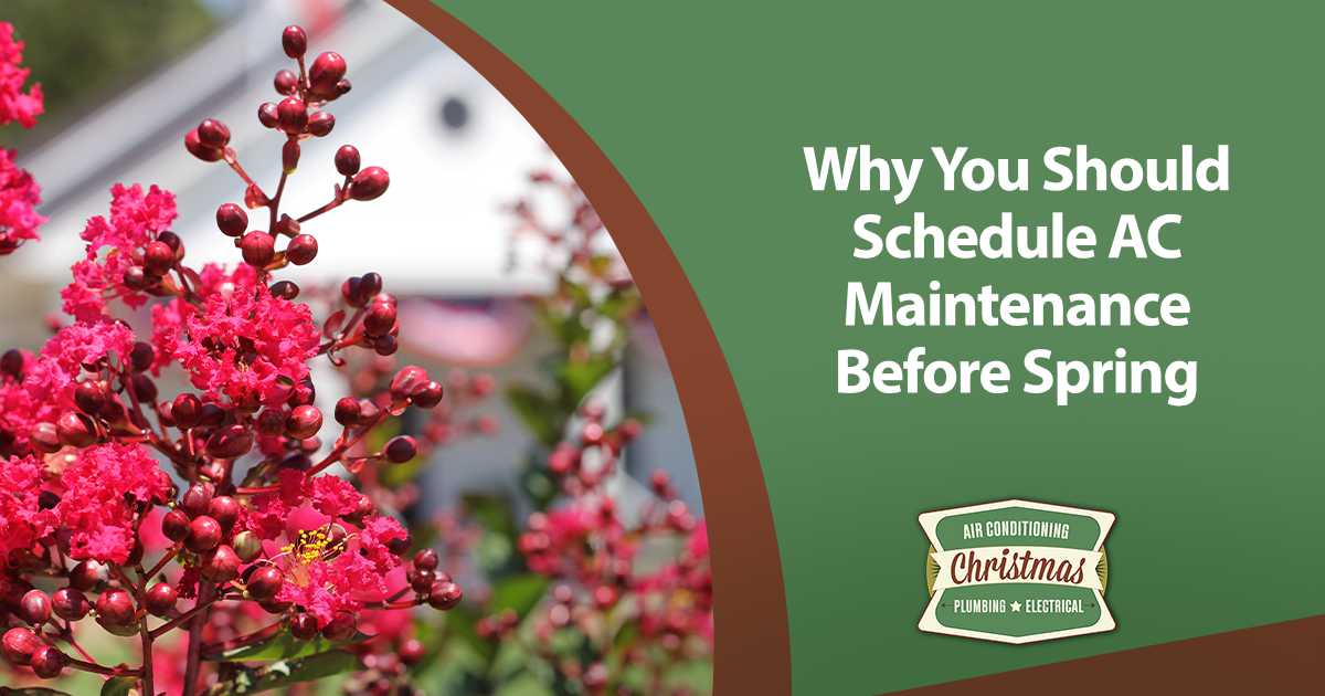 Pink spring flowers in front of a house promoting seasonal AC maintenance.