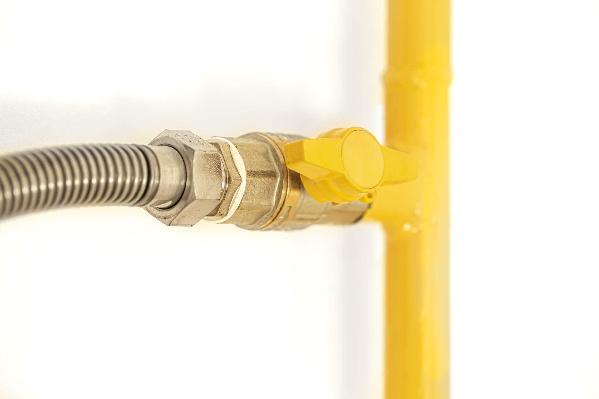 Image of a yellow gas pipe, featuring Christmas Airconditioning and Plumbing, highlighting expert gas line installation and repair services in line with the page’s context.