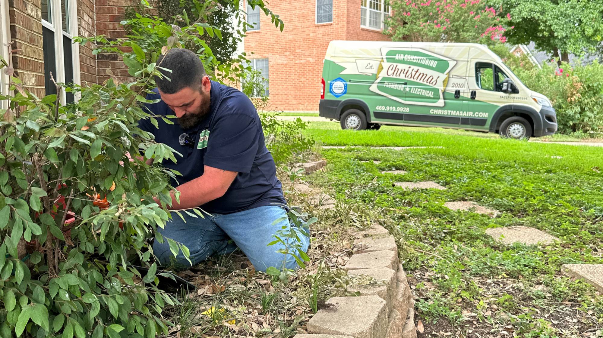 Christmas Air plumber working at a North DFW home